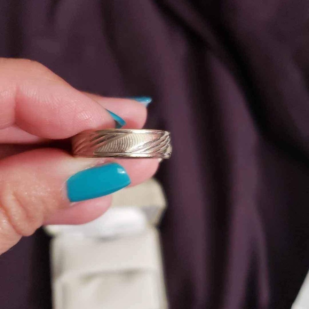 Mens 10k white gold wedding band.